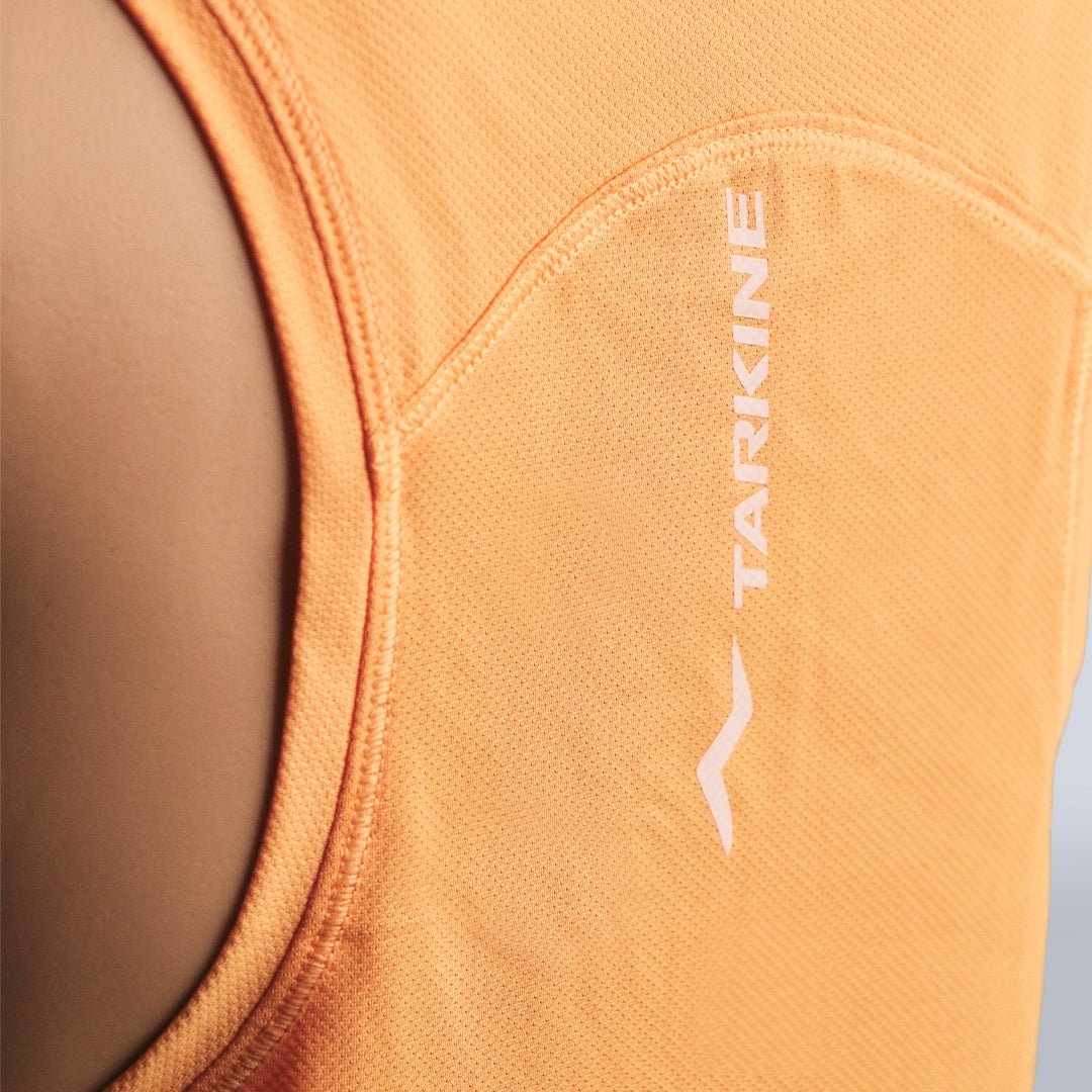 Women's Peach Eco-Light Running Singlet - Premium  from TARKINE RUNNING - Just $70! Shop now at TARKINE ATHLETICS