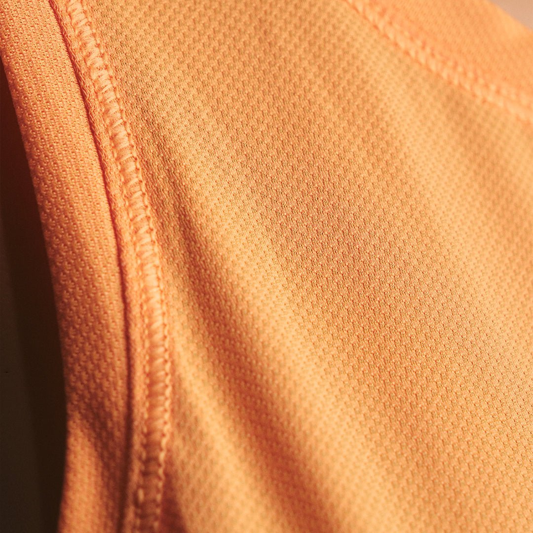 Women's Peach Eco-Light Running Singlet - Premium  from TARKINE RUNNING - Just $70! Shop now at TARKINE ATHLETICS