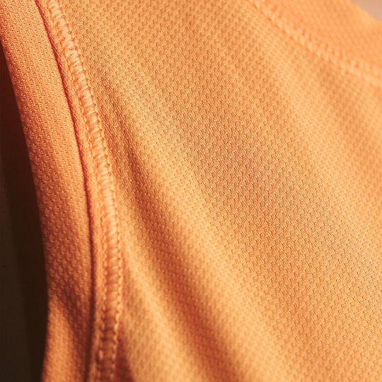 Women's Peach Eco-Light Running Singlet - Premium  from TARKINE RUNNING - Just $70! Shop now at TARKINE ATHLETICS